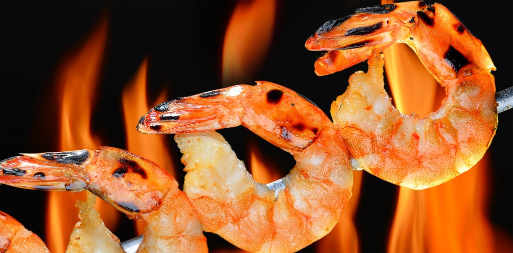 Shrimp cooking over fire at Broadway at the Beach